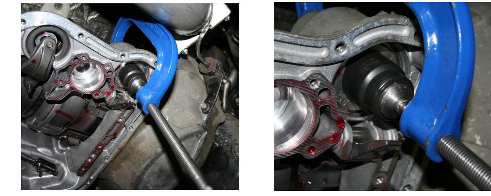 Using a 6 inch C-clamp and socket to depress the servo piston guide into the bore