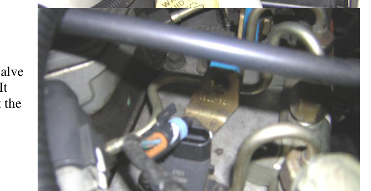 MAP sensor with blue weather-tight seal beside the valve cover, ready for in-line connection