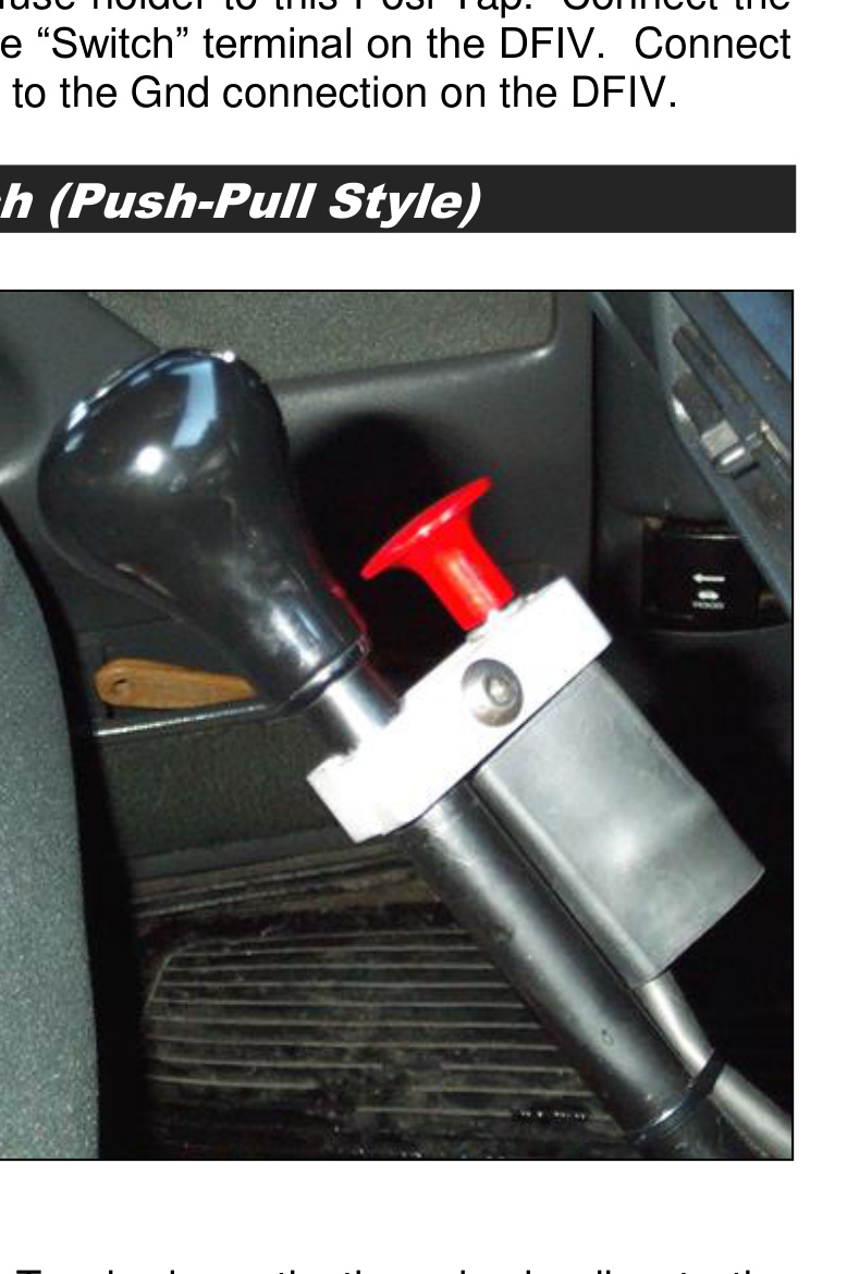 Push-pull style manual shifter switch mounted on the shift lever