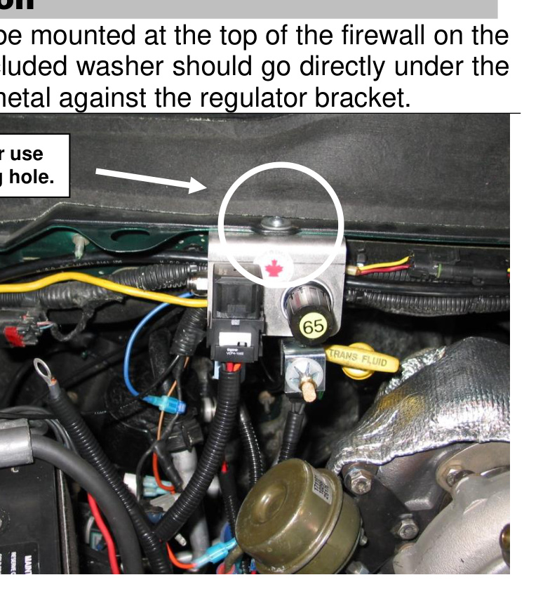 Air pressure regulator assembly mounted at the top of the firewall, passenger side
