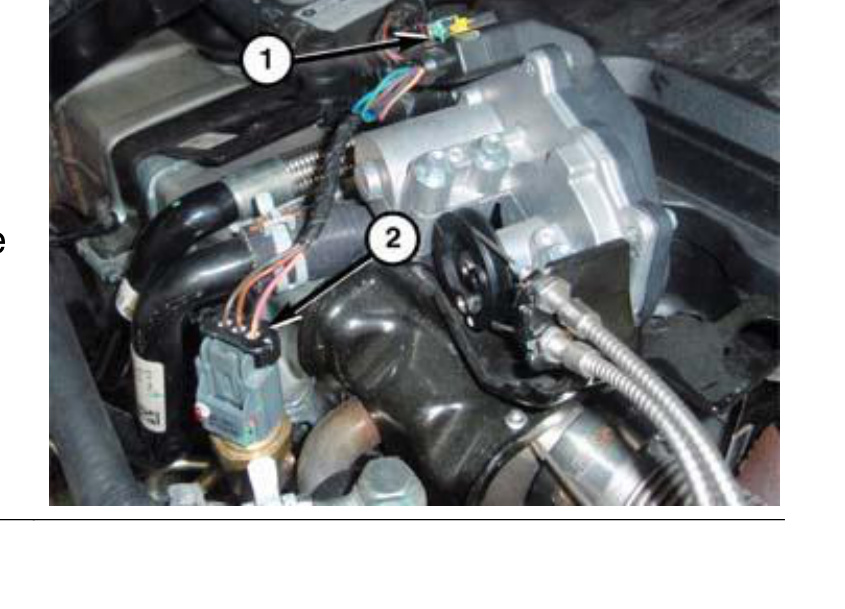 EGR cooler bypass valve connector (1) and exhaust pressure sensor connector (2)