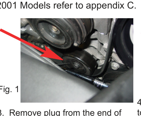 Idler pulley installed in the threaded hole on the engine bracket