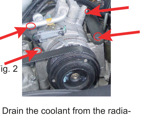 The four A/C compressor mounting bolts circled