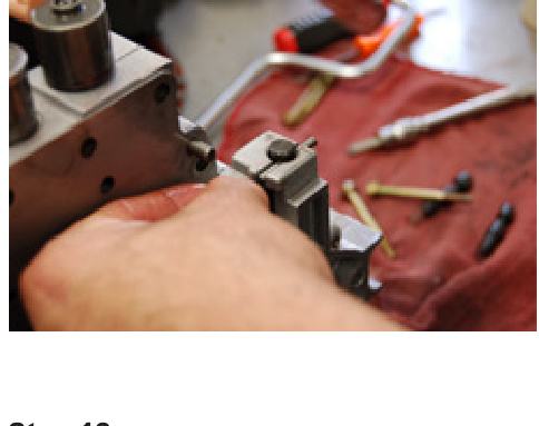 Sliding the valve into the valve body