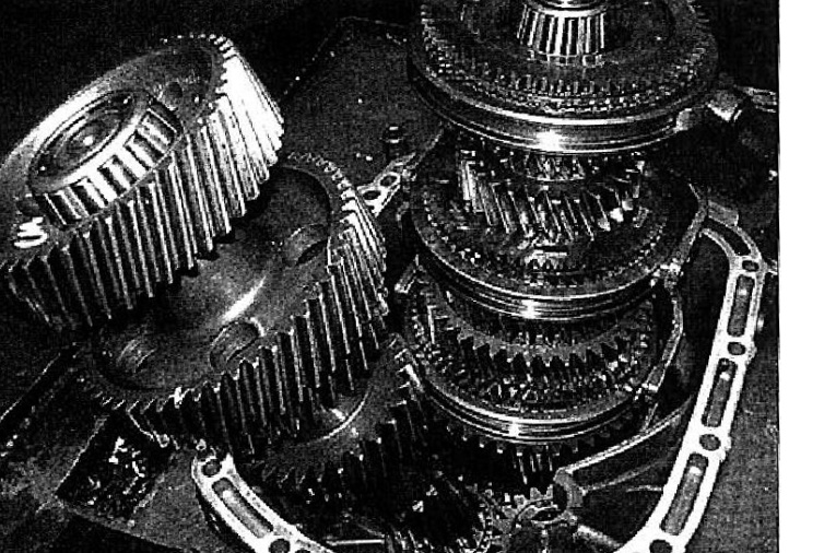 Separating the cluster and mainshaft assemblies after moving the reverse idler gear aside