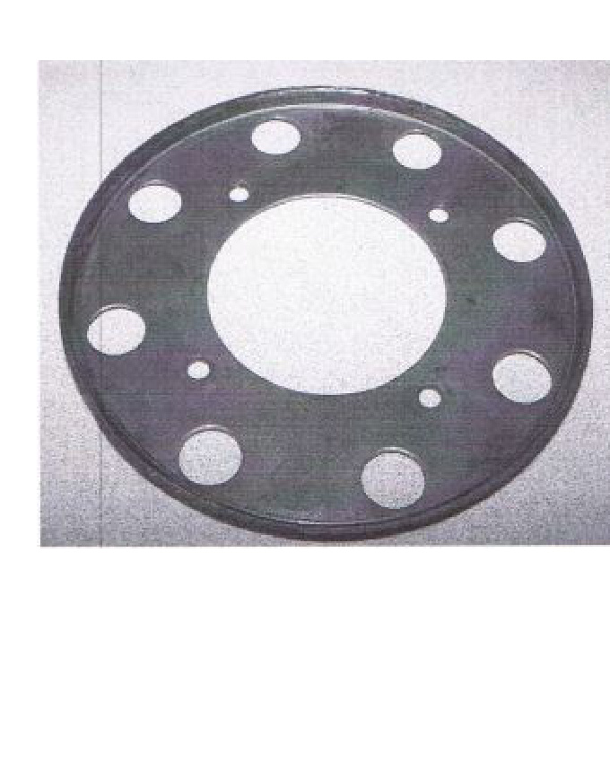 Tin plate left on the Dodge Cummins G56 crank flange after the OE flywheel is removed